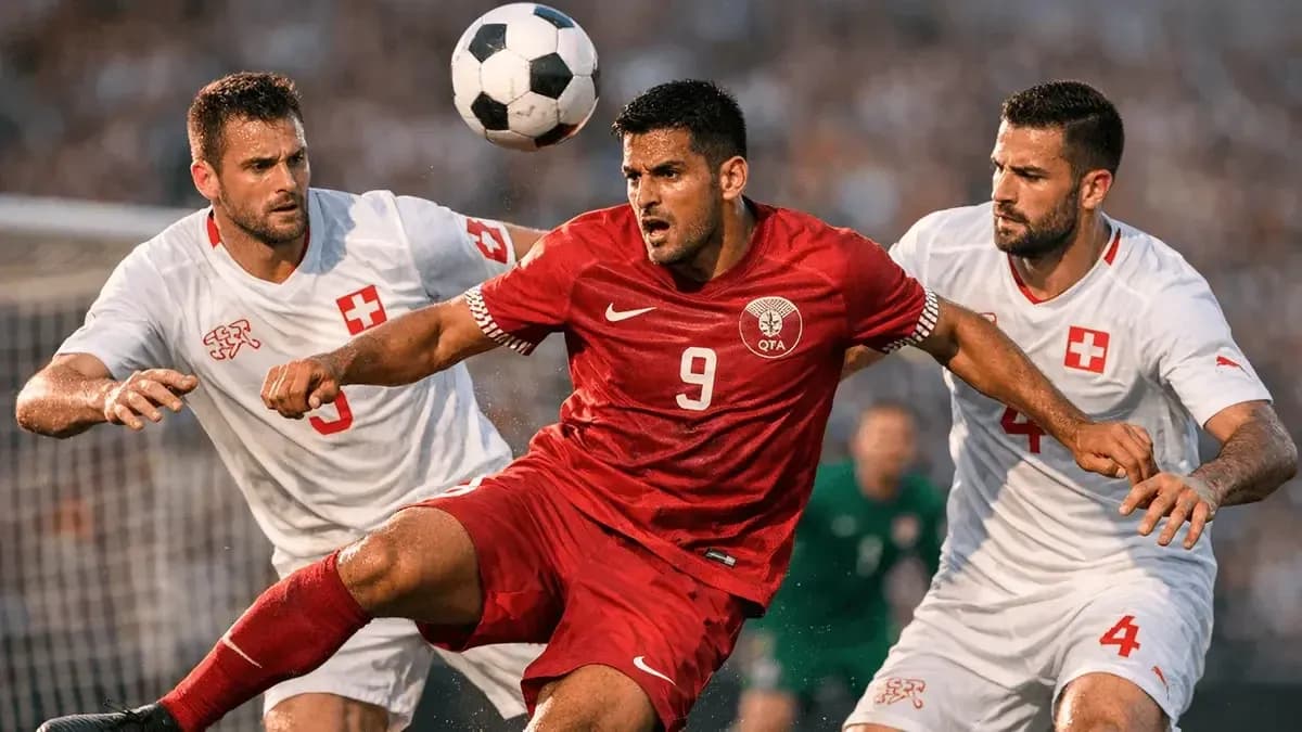 Jugador de Qatar luchando por el balón contra Suiza