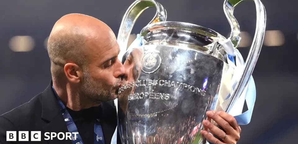 Entrenador besando la UEFA Champions League