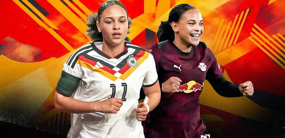 Jugadoras de fútbol en uniforme compitiendo