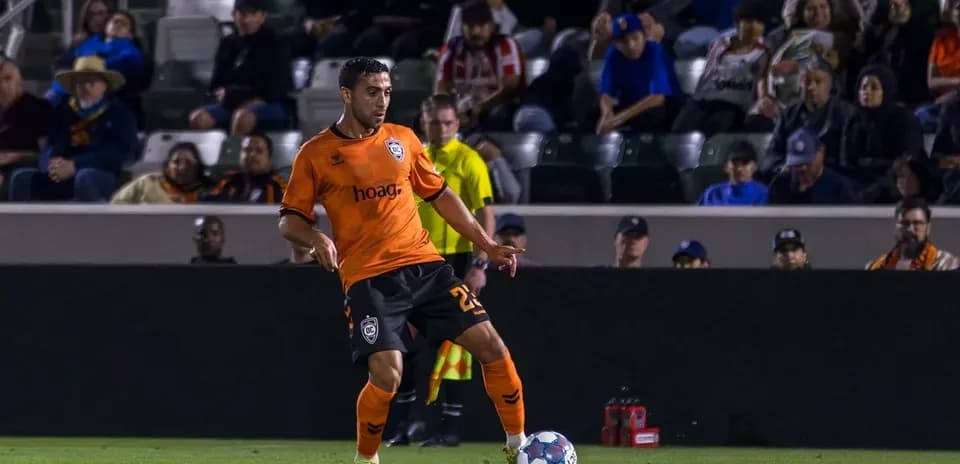 Jugador de Orange County SC en acción Jugador de Orange County SC en acción