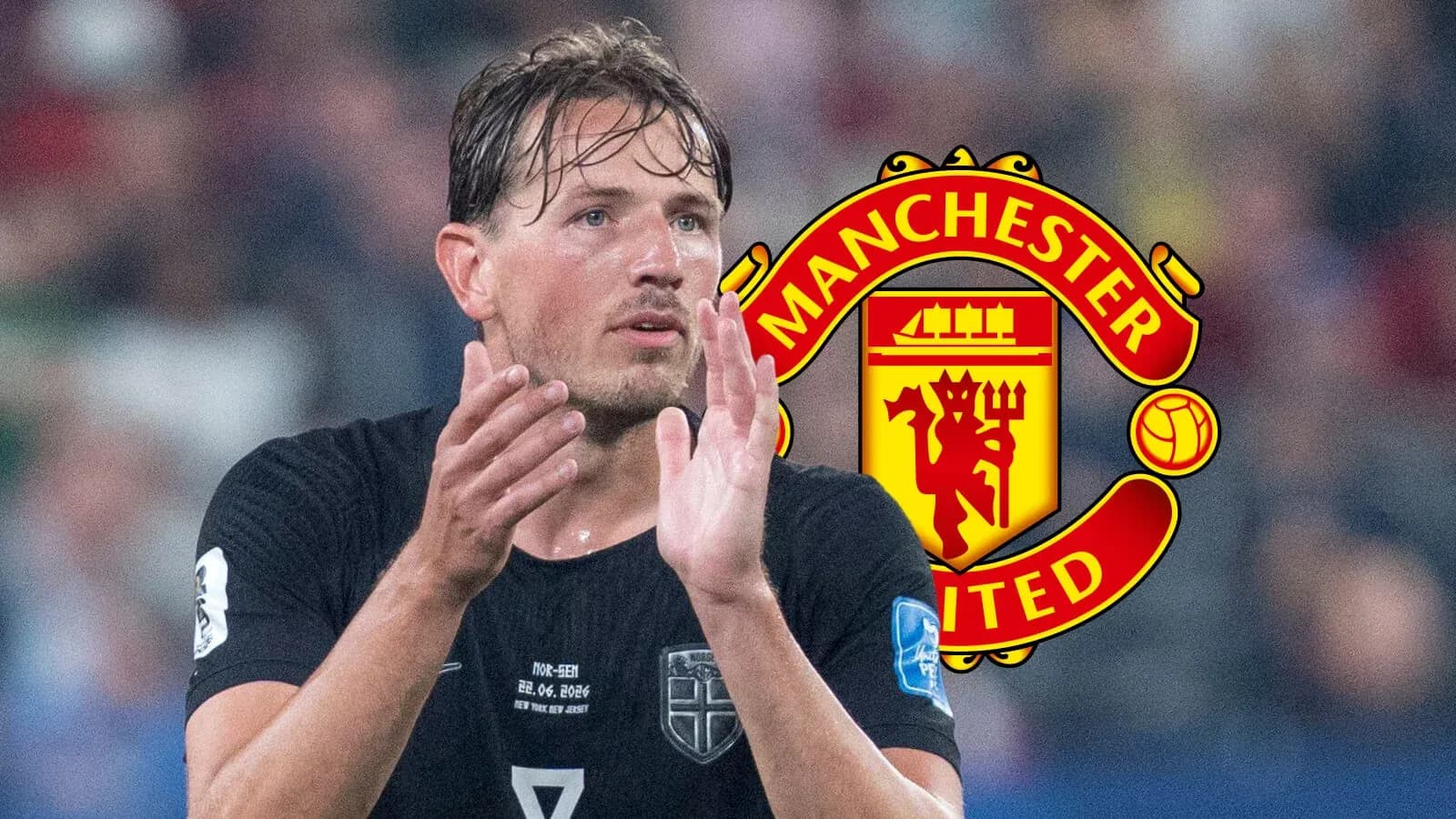 Jugador aplaudiendo con logo de Manchester United detrás Jugador aplaudiendo con logo de Manchester United detrás