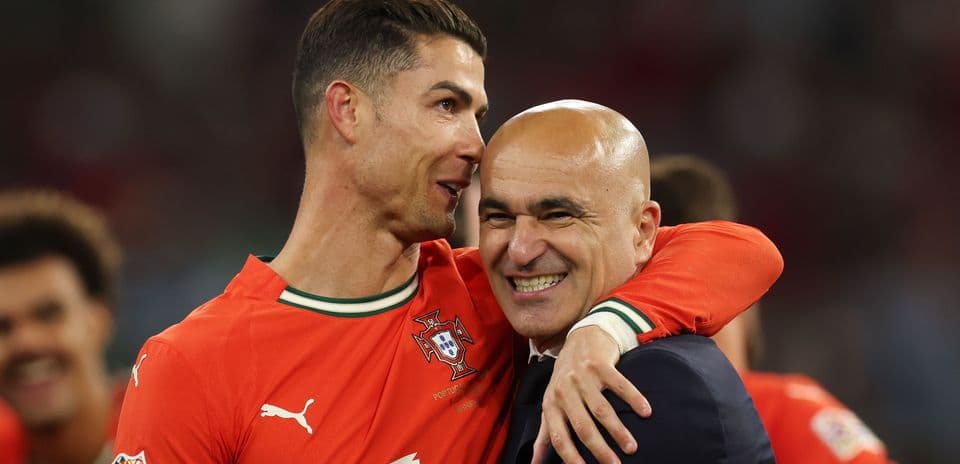 Cristiano Ronaldo y Roberto Martínez celebrando juntos Cristiano Ronaldo y Roberto Martínez celebrando juntos