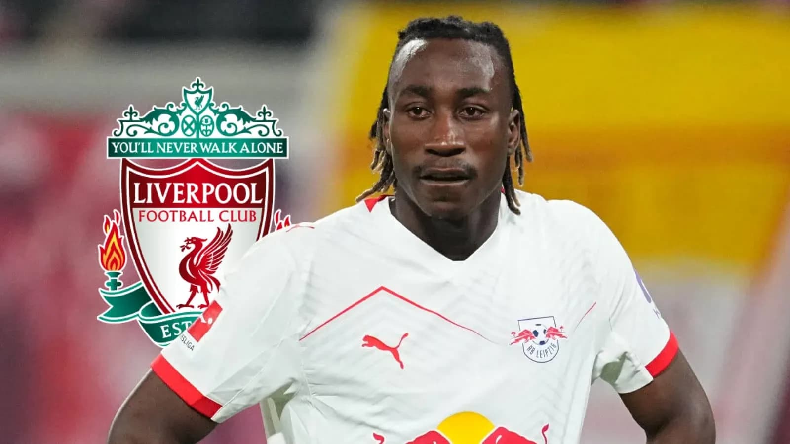 Jugador de RB Leipzig con logo de Liverpool detrás Jugador de RB Leipzig con logo de Liverpool detrás