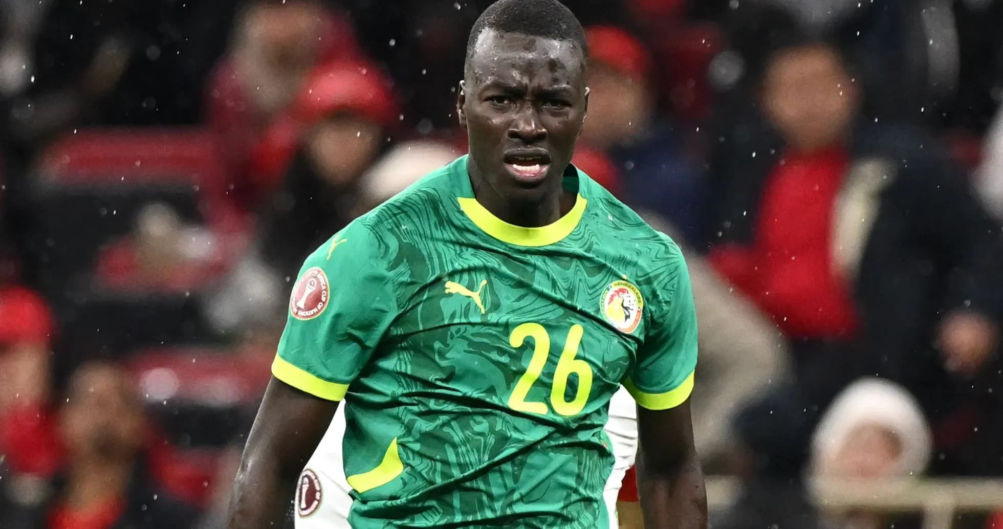 Jugador de Senegal en acción durante el partido Jugador de Senegal en acción durante el partido
